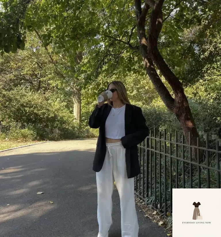 25 Black Blazer Outfit That Are Breathtakingly Beautiful 9 Black Blazer with White Crop Top and Relaxed Trousers