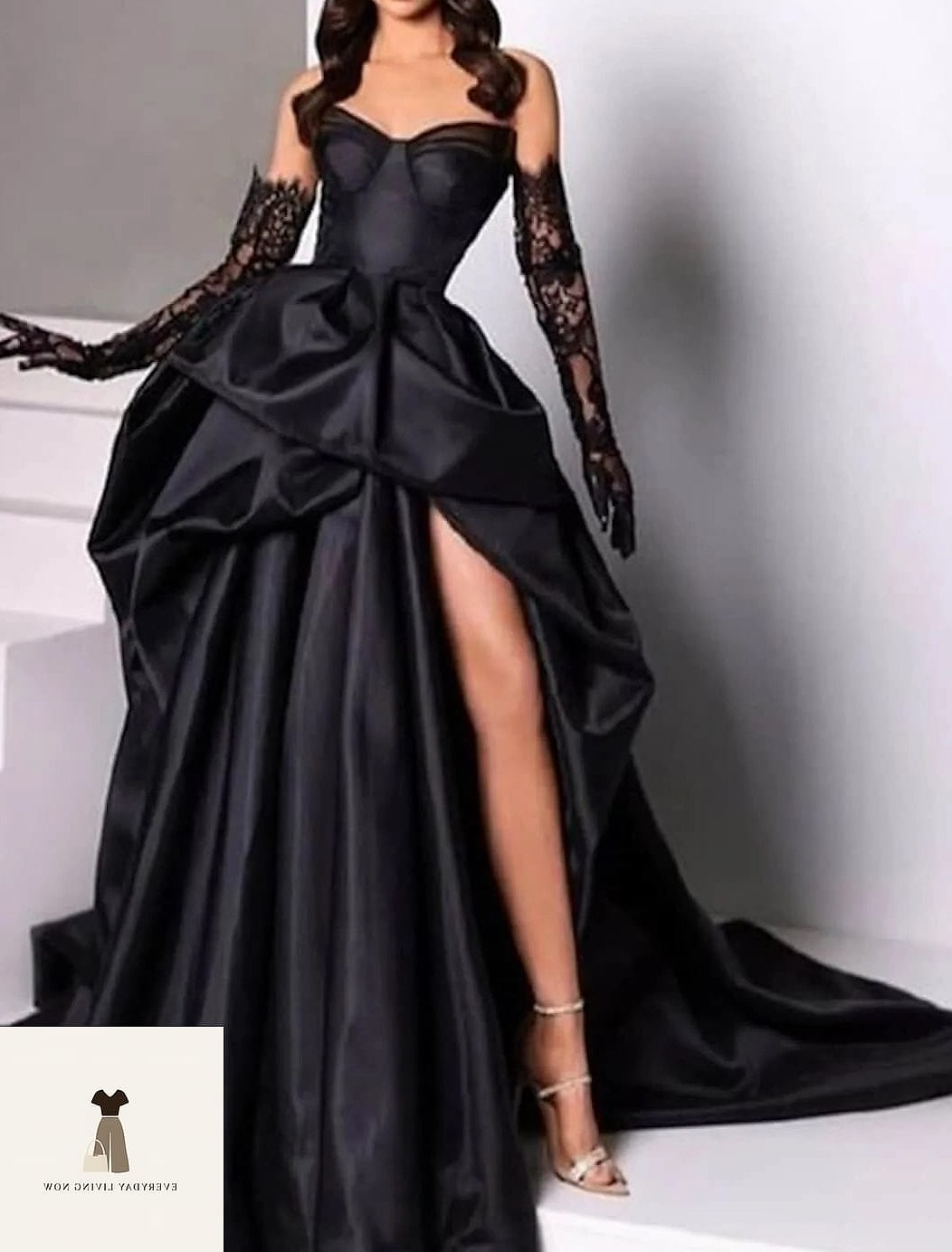25 Masquerade Outfit Ideas You Need to Try Next 2 The Classic Black Gown and Feather Mask