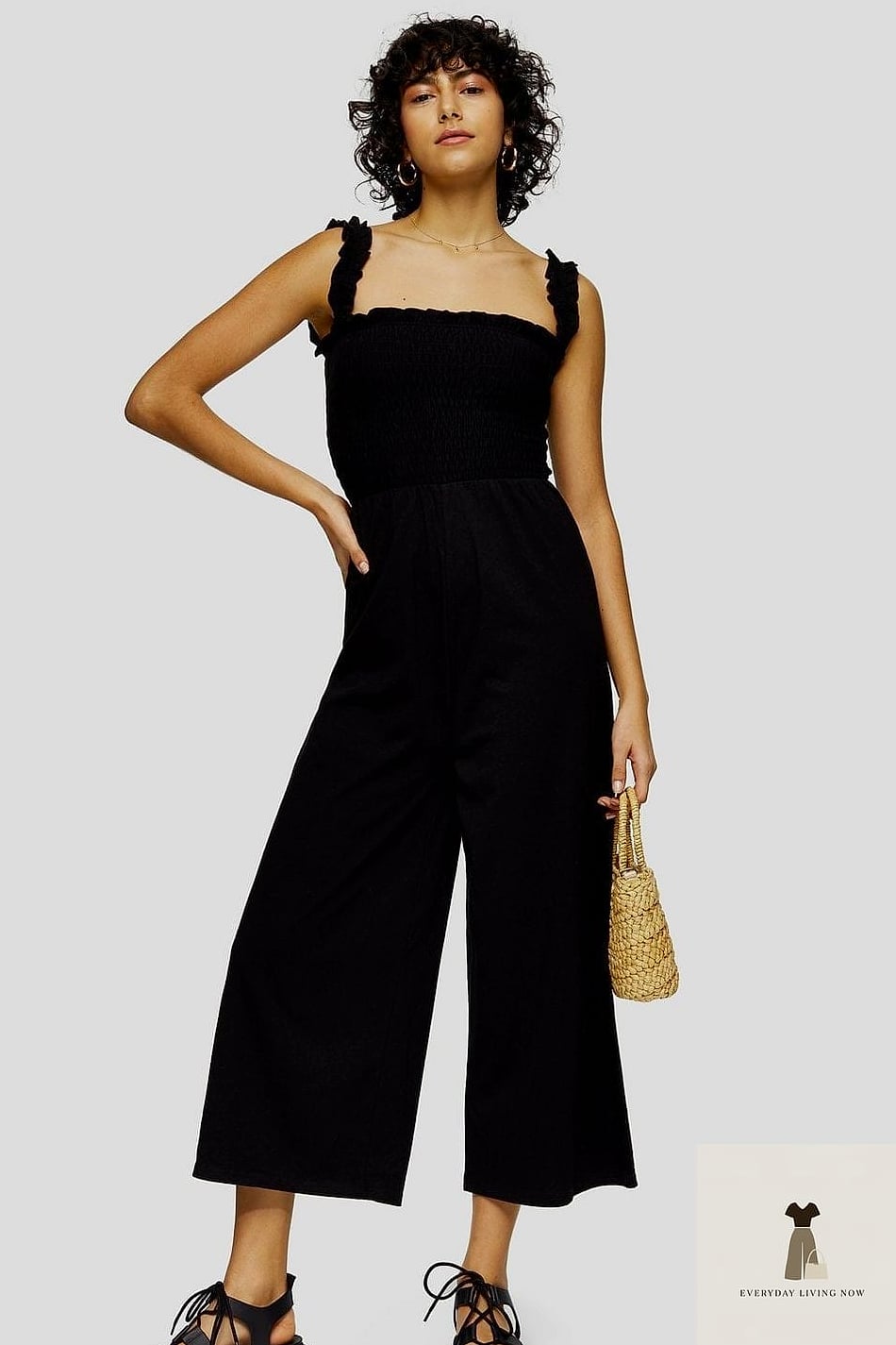 The Classic Black Jumpsuit With Strappy Heels