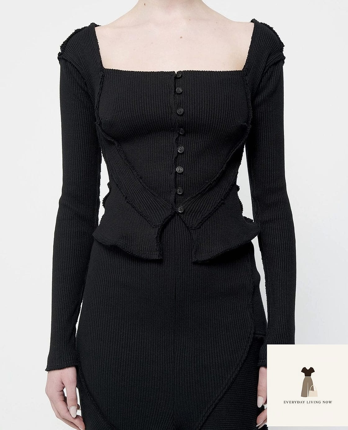 Corset with a Cardigan Layered Overtop