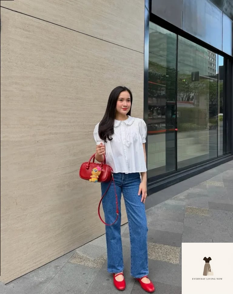 Crisp White Smocked Blouse with Medium Wash Denim and Cherry Red Accents