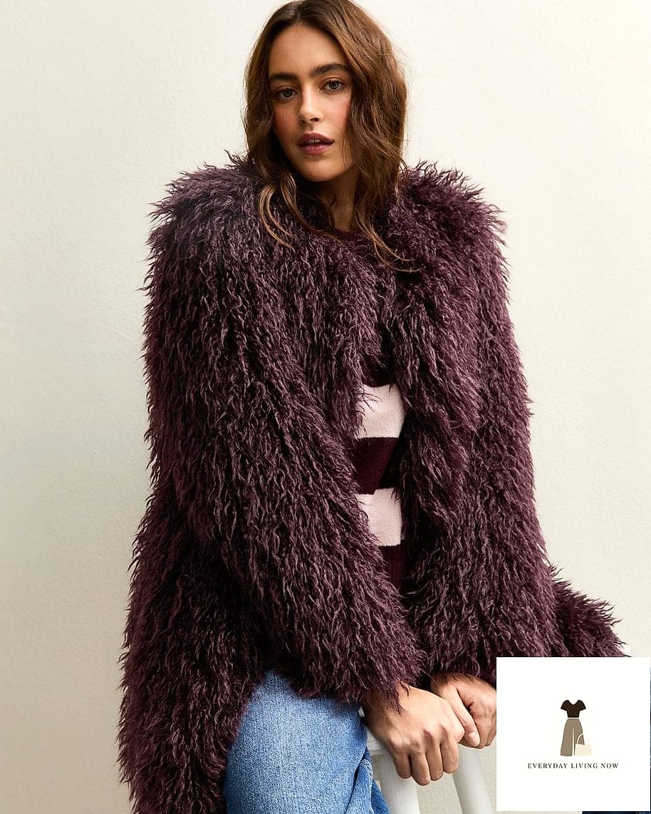 Fur Coat Layered Over a Chunky Knit