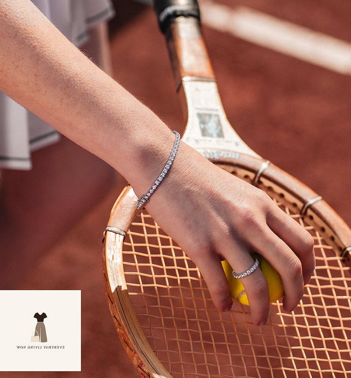 Layered Gold Jewelry With a Simple White Set