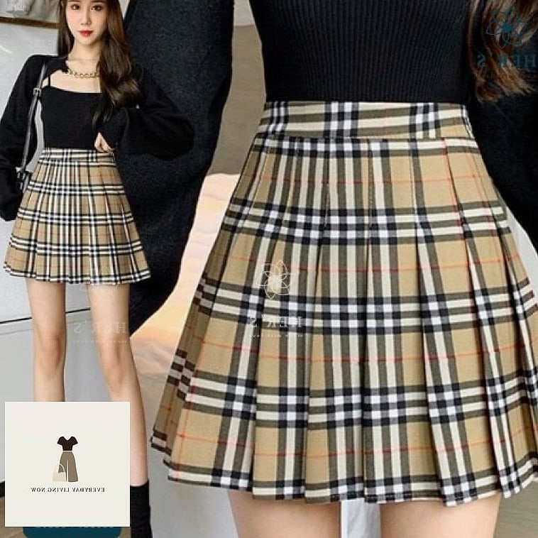 The Plaid Mini Skirt and Knit Vest Pairing