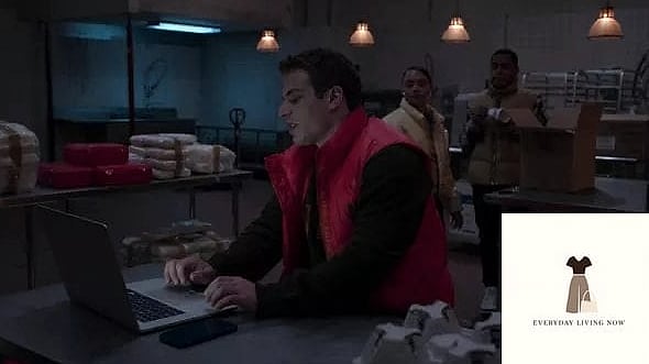 Red Puffer Vest Over a Turtleneck