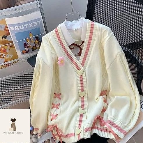 Sweater Vest Over Puff Sleeve Blouse