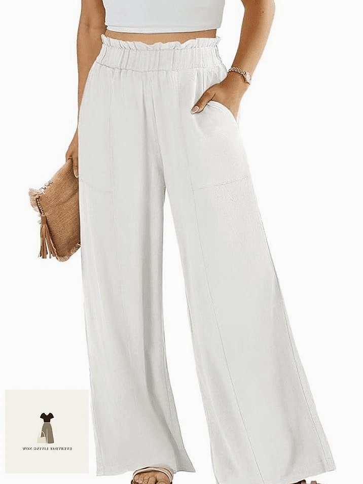 White Linen Pants with a Bold Print Blouse