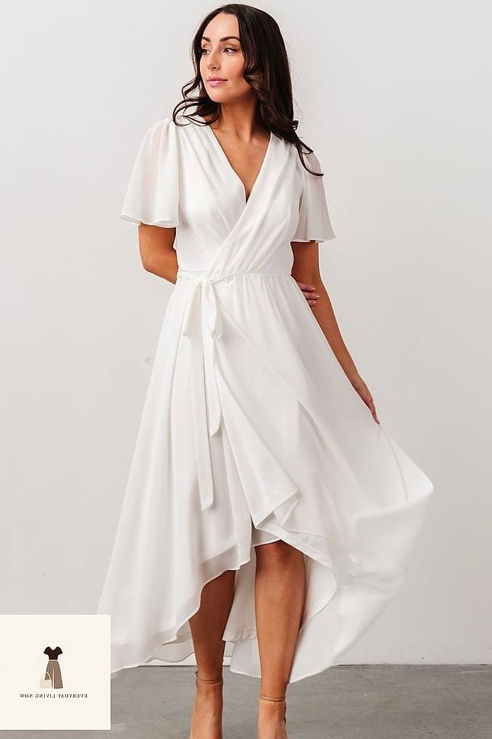 27 White Outfit That Are Breathtakingly Beautiful 7 White Wrap Dress for Effortless Elegance