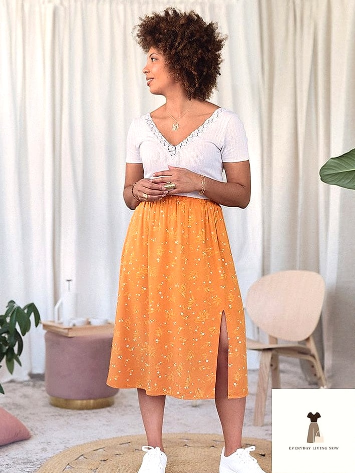 27 Yellow Outfit Every Style Lover Needs to See 17 Yellow Slip Skirt With a Graphic Tee
